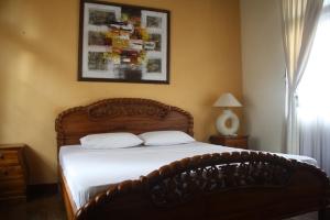 Postel nebo postele na pokoji v ubytování De Puspa Residence Seminyak