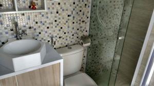 Ein Badezimmer in der Unterkunft Suite cantinho do sossego