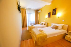 Posteľ alebo postele v izbe v ubytovaní Hotel Pine