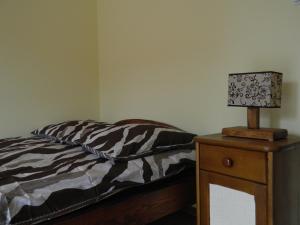 Letto o letti in una camera di Dom Bartek