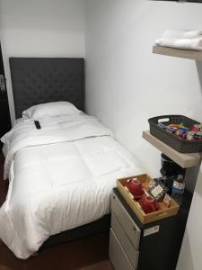 Una cama o camas en una habitación de Hotel OrangeTrip