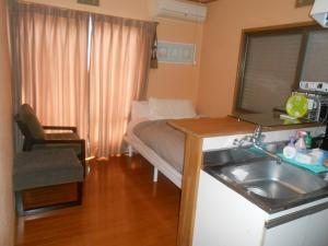 A kitchen or kitchenette at Share House on the Hill