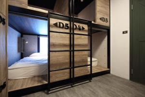 Letto o letti in una camera di G.O.A.T Hostel