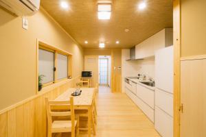 Kuchyň nebo kuchyňský kout v ubytování Miro Shijo Saiin Tei