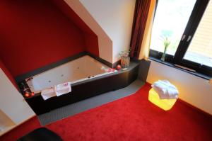 Ein Bett oder Betten in einem Zimmer der Unterkunft Hotel Antoniushütte