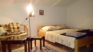 Posteľ alebo postele v izbe v ubytovaní Apartmani ZP44