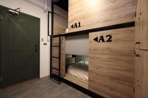 Letto o letti in una camera di G.O.A.T Hostel