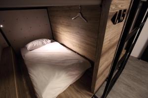 Letto o letti in una camera di G.O.A.T Hostel