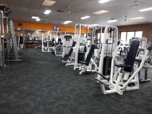 a gym with several rows of tread machines at Addison Motor Inn in Shepparton