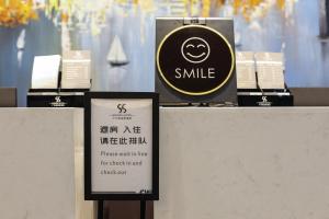 Certifikát, hodnocení, plakát nebo jiný dokument vystavený v ubytování Guangzhou Homies Hotel