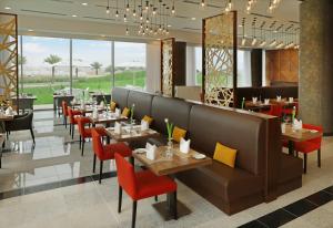 מסעדה או מקום אחר לאכול בו ב-Millennium Madinah Airport