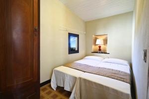 Postel nebo postele na pokoji v ubytování I Valloni Apartments