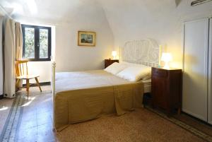 Postel nebo postele na pokoji v ubytování I Valloni Apartments