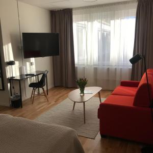 TV a/nebo společenská místnost v ubytování Hotel Falun