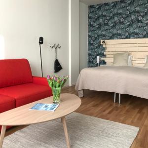 Postel nebo postele na pokoji v ubytování Hotel Falun