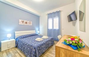 Postel nebo postele na pokoji v ubytování Al Mare