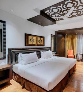 Letto o letti in una camera di Mayfair Convention