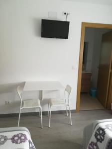 TV a/nebo společenská místnost v ubytování Pension Diana