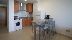 Kuchnia lub aneks kuchenny w obiekcie As Apartamentos Turisticos