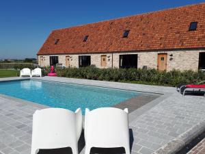 Bazén v ubytovaní vakantiehoeve 't Goed ter Leeuwen alebo v jeho blízkosti