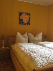 Cama ou camas em um quarto em Ferienhaus am Kyffhauser