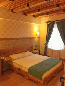 Postelja oz. postelje v sobi nastanitve Assos Kervansaray Hotel - Special Category