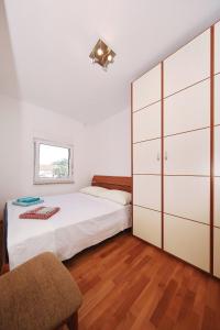 Apartment Sapavac tesisinde bir odada yatak veya yataklar