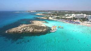 a group of people on boats in the ocean at Athena Villa in Ayia Napa