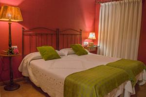 Postel nebo postele na pokoji v ubytování Hotel del Alto Sella