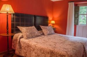 Postel nebo postele na pokoji v ubytování Hotel del Alto Sella