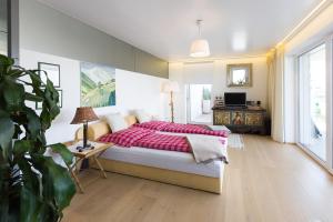 Postel nebo postele na pokoji v ubytování Apartments Villa Traunseeblick