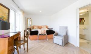 TV a/nebo společenská místnost v ubytování Apartments Villa Traunseeblick