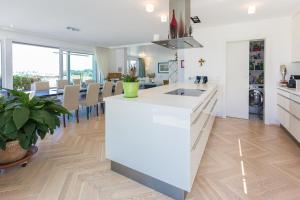 Kuchyň nebo kuchyňský kout v ubytování Apartments Villa Traunseeblick