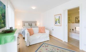 Postel nebo postele na pokoji v ubytování Apartments Villa Traunseeblick