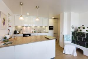 Kuchyň nebo kuchyňský kout v ubytování Apartments Villa Traunseeblick