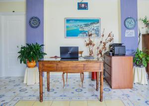 TV a/nebo společenská místnost v ubytování Villa Maredona