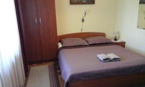 Postel nebo postele na pokoji v ubytování Apartment Mara