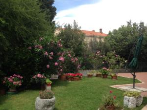 Κήπος έξω από το Casa Vacanze All'Orizzonte Duino