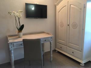 TV a/nebo společenská místnost v ubytování B&B Elena