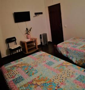 Cama o camas de una habitación en Residencial Ponto Certo