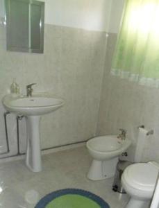 Salle de bains dans l'établissement Residencial Ponto Certo