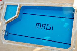 The swimming pool at or close to Magi Apart Hotel
