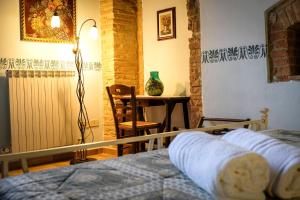A bed or beds in a room at Agriturismo Casale Dei Frontini