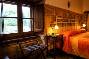 A bed or beds in a room at Agriturismo Casale Dei Frontini