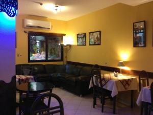 Restoran atau tempat lain untuk makan di Aspen Hotel & Apart