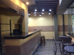 Restoran atau tempat lain untuk makan di Aspen Hotel & Apart