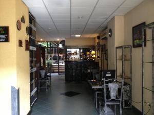 Restoran atau tempat lain untuk makan di Aspen Hotel & Apart