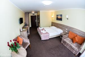 Giường trong phòng chung tại Hotel Na Skarpie