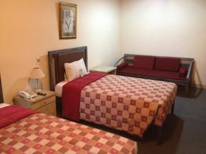 Katil atau katil-katil dalam bilik di Aspen Hotel & Apart