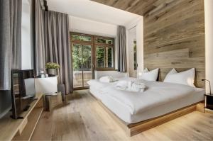 Ένα ή περισσότερα κρεβάτια σε δωμάτιο στο Seehotel Bellevue